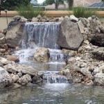 REBUILD WATERFALL WITH EXISTING ROCK
