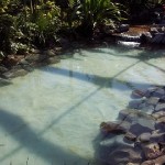 SWIMMING LAGOON WITH SAND BOTTOM